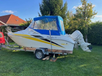 OLYMPIA 570 motorový člun s motorem EVINRUDE E90 - r.v.2012